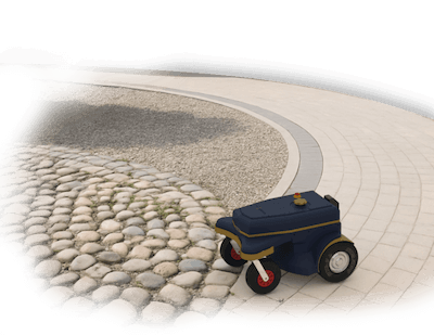 A weed free gravel driveway with stone paved areas
